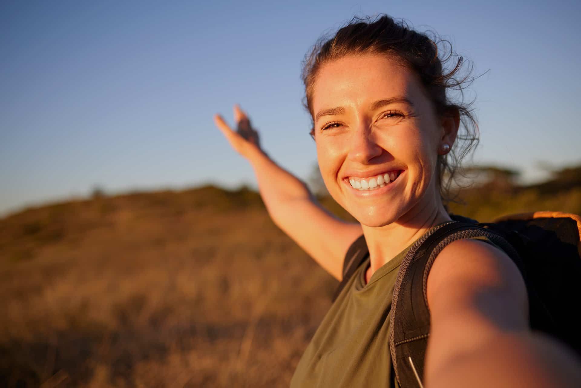 A woman feeling happy after attending Sacramento IOP.